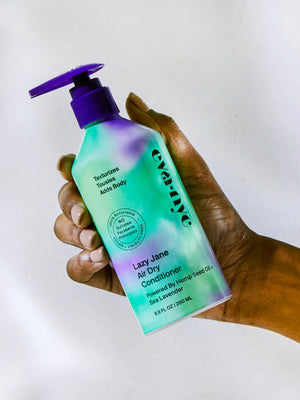 Eva NYC Lazy Jane Air Dry Conditioner in hand