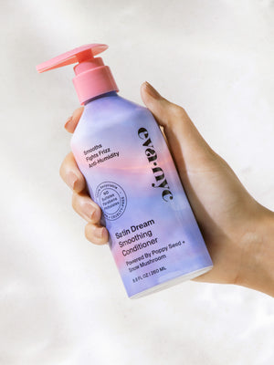Eva NYC Satin Dream Smoothing Conditioner in hand
